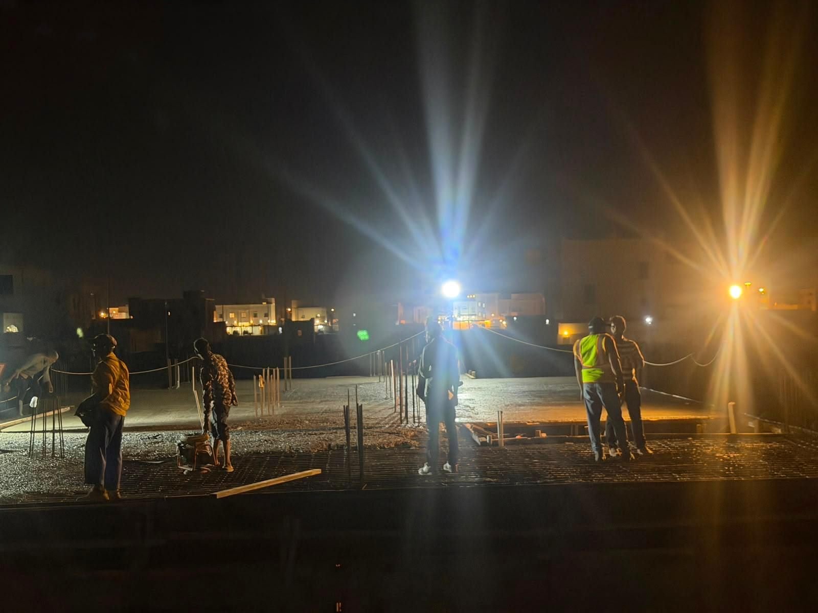 Fareeq Al Suroor crew working safely under floodlights at night
